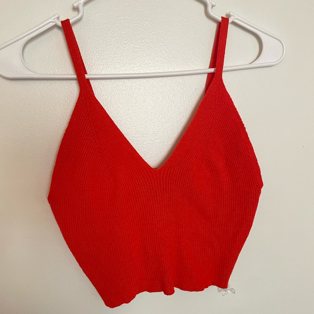 Bright orange/red knitted beach top